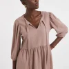 Blush Bow Blouson Peplum Top